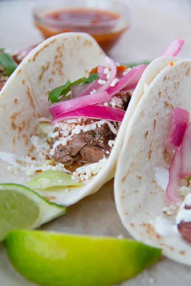 Groundhog Tacos W/ Pickled onions & White sauce